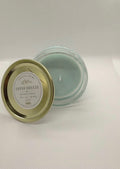 Fresh Breeze 16 oz beeswax candle in a glass jar